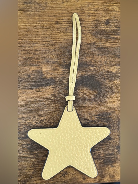 Coach Accessories - Coach Yellow Leather Star Bag Charm NWOT